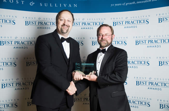 AMD Telemedicine leadership accepting the Frost Sullivan Award